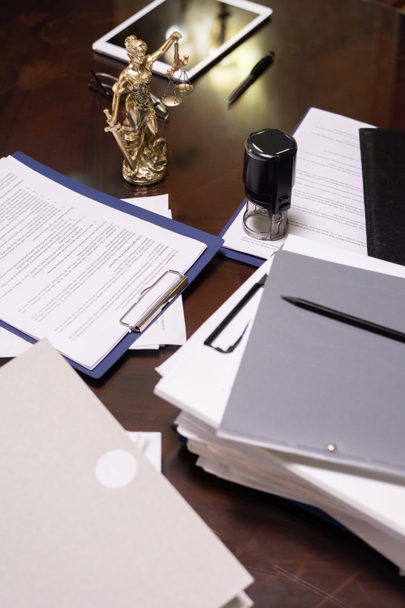 Group of objects and several stacks of juridical papers